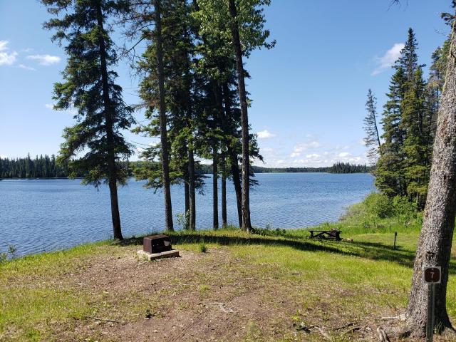 A campsite looking out over Singush Lake
