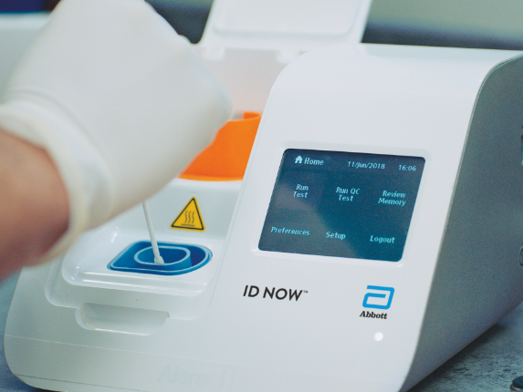 Pictured: the Abbot ID NOW rapid testing device | courtesy of Abbot.com